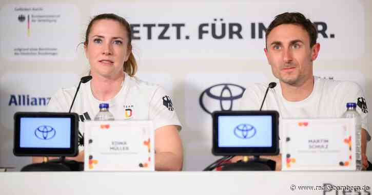 Kanutin Müller und Triathlet Schulz tragen deutsche Fahne