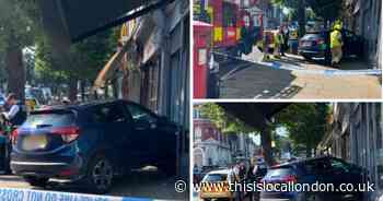 Pictures from scene of 'car crashing into nail salon' in Blackheath