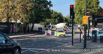 Motorcyclist taken to hospital after crash with cement mixer