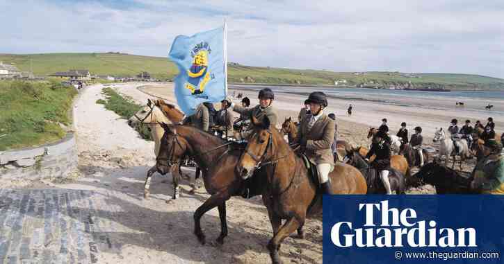 Country diary: A plucky band of riders wade into the waves | Cal Flyn