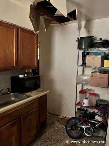 Officials were seeking a Tennessee murder suspect when he came crashing through the ceiling