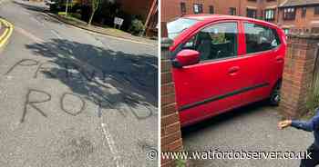 Residents 'block path with car and graffiti own road' over school parking row