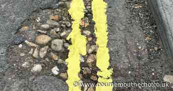 Council defends its decision to paint double yellow lines across potholes