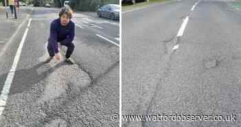 Pothole-plagued road still 'crying out' for fix despite nearby repairs