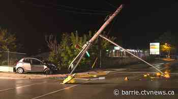 Driver arrested after crashing into electric pole