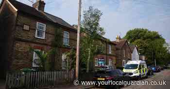 Dad found dead along with three children inside Surrey home named