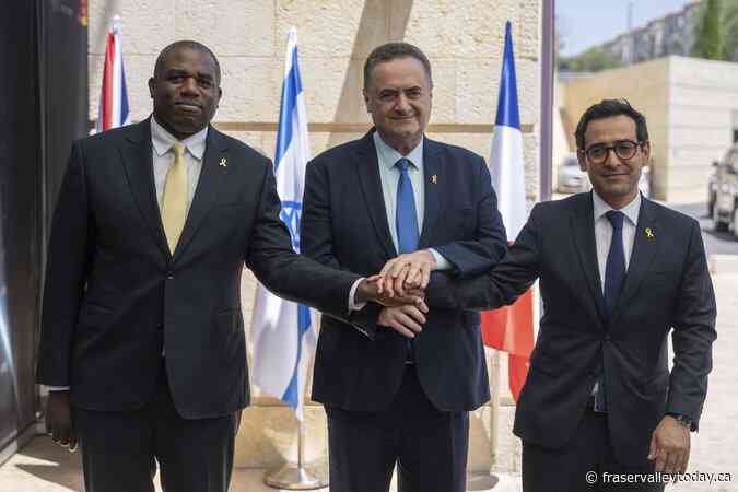 Britain says it is suspending some arms exports to Israel over risk of breaking international law