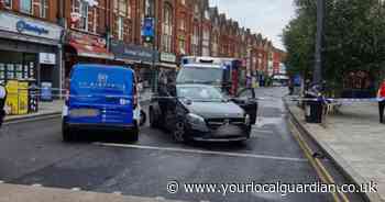 Two arrested and one in hospital after 'argument' in West Norwood crash