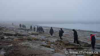 At least 13 are dead after a boat with dozens of migrants rips apart in waters off northern France