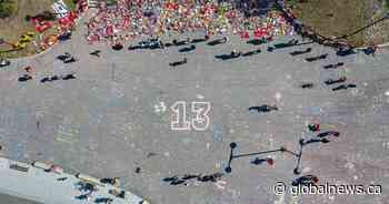 Makeshift memorial for Johnny Gaudreau continues to grow, attract visitors in Calgary