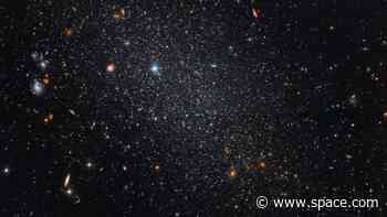 Hubble telescope spies a sparkling 'cosmic fossil' 3 million light-years away (image)