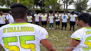 Teammates hold vigil for Polk County football player who died kayaking