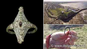 'Remarkable' Pictish ring is discovered after 1,000 years: Kite-shaped band with a garnet at the centre is uncovered at Burghead Fort in Moray
