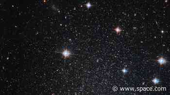 Hubble Telescope spies a very sparkly mini-galaxy (image)