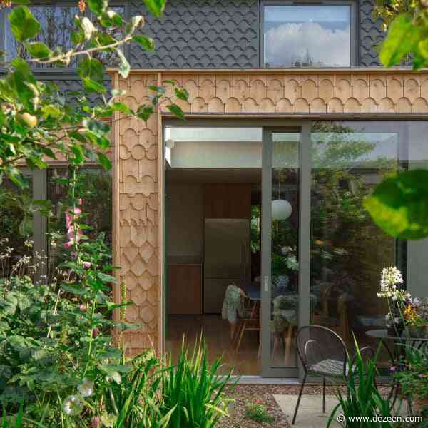 The DHaus Company clads Gingerbread House extension in wooden shingles