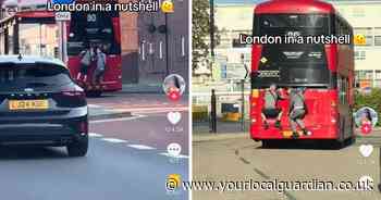 WATCH as males cling to back of moving TfL bus in Sutton