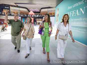 Shoppers, gawkers flock to Royalmount mall opening