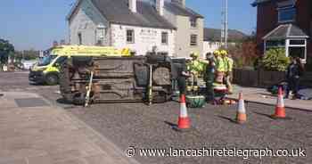 Police and Fire Service deal with overturned car in Preston
