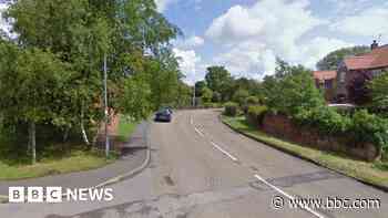 Man dies and woman injured in two-car crash