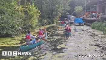 Amputees prepare their paddles for canoe challenge