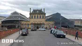 Police officer and rail worker assaulted at station