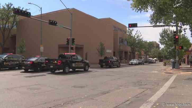 Shooting in Santa Fe cancels events; suspect in custody