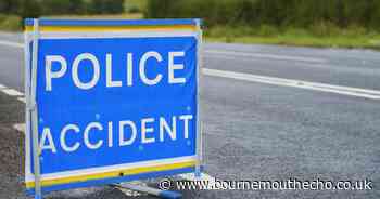 Road closed after motorbike and car crash