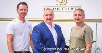 Three employees take on mountain for charity