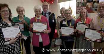 Volunteers aged 12 to 93 enjoy hot pot supper and celebration in their honour