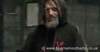 Man attempts to rob person taking money out of cash machine