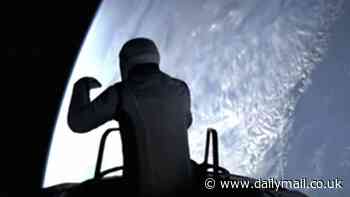 Billionaire steps outside his SpaceX capsule in 'dangerous' first ever private spacewalk... as his historic first words are revealed