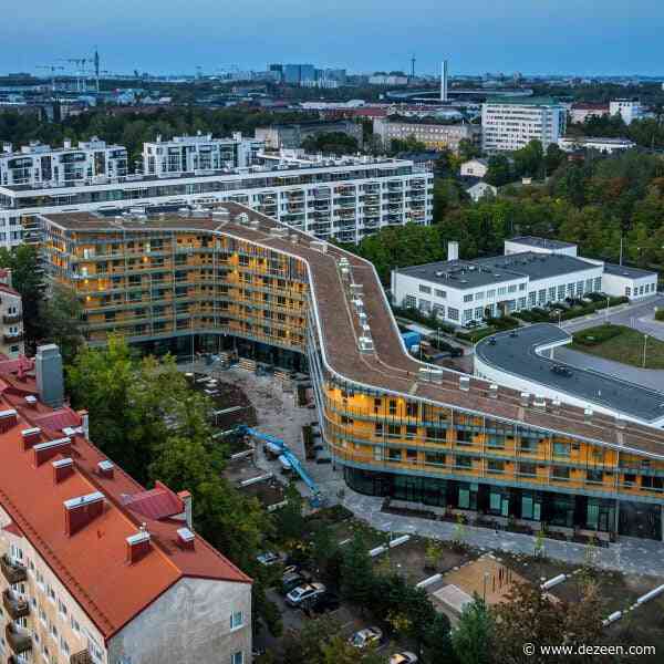 Steven Holl winds Meander housing around gardens in Helsinki