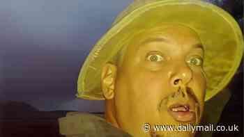 The first 'UFO selfie': Stunning photos of glowing spherical craft with yellow 'landing lights'