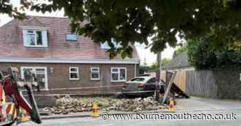 LIVE: Road closed after car rams into wall during police chase