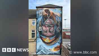 Upside down mural leaves community baffled