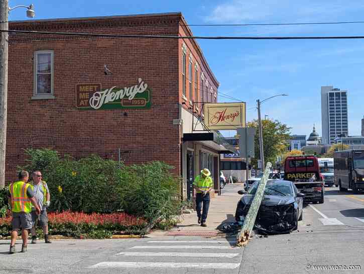 Car crashes into light pole on West Main Street