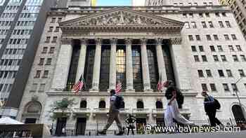 Wall Street climbs to the cusp of records, closes its best week of the year