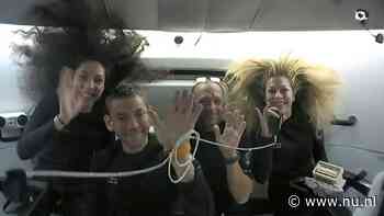 Astronauten die eerste commerciële ruimtewandeling maakten terug op aarde