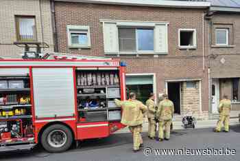 Poetshulp gooit brandende droogkast buiten