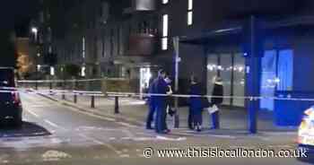 Woman charged with murder after fatal stabbing in flat block foyer