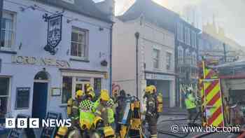 Firefighters tackle takeaway restaurant blaze