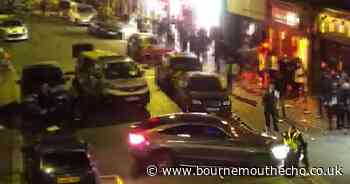 WATCH: Motorist crashes into police officers in town centre hit and run