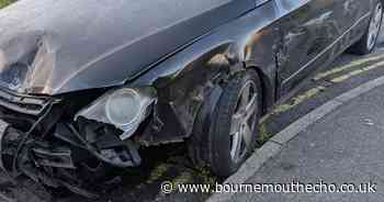 Damaged Volkswagen Passat dumped near Poole Quay