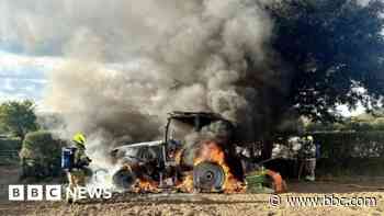 Tractor fire in field extinguished by crews