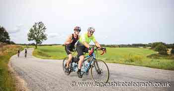 Visually impaired man completes Ironman inspired by son's health battle