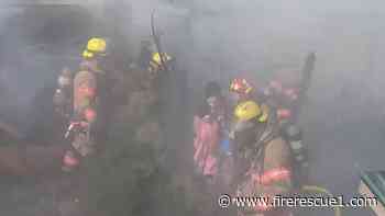 Watch: Ore. firefighters rescue woman trapped in bathroom during basement fire