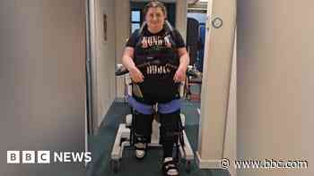 Robot skeleton helps paralysed woman 'walk again'