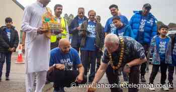 Hindu temple volunteers- age 6 to to 70+ - brave rain to complete 10k walk