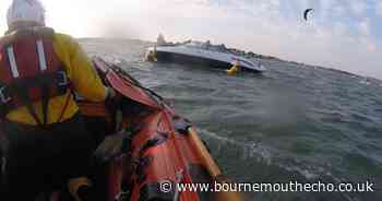 Poole RNLI save 25ft foot speedboat stuck on Hook Sands
