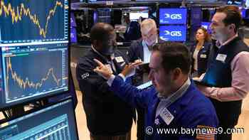 Wall Street soars to records in a rate-cut rally that swept the world